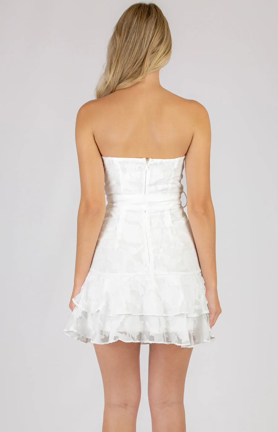 Hot little White Strapless Mini Dress with Frill Hem Details