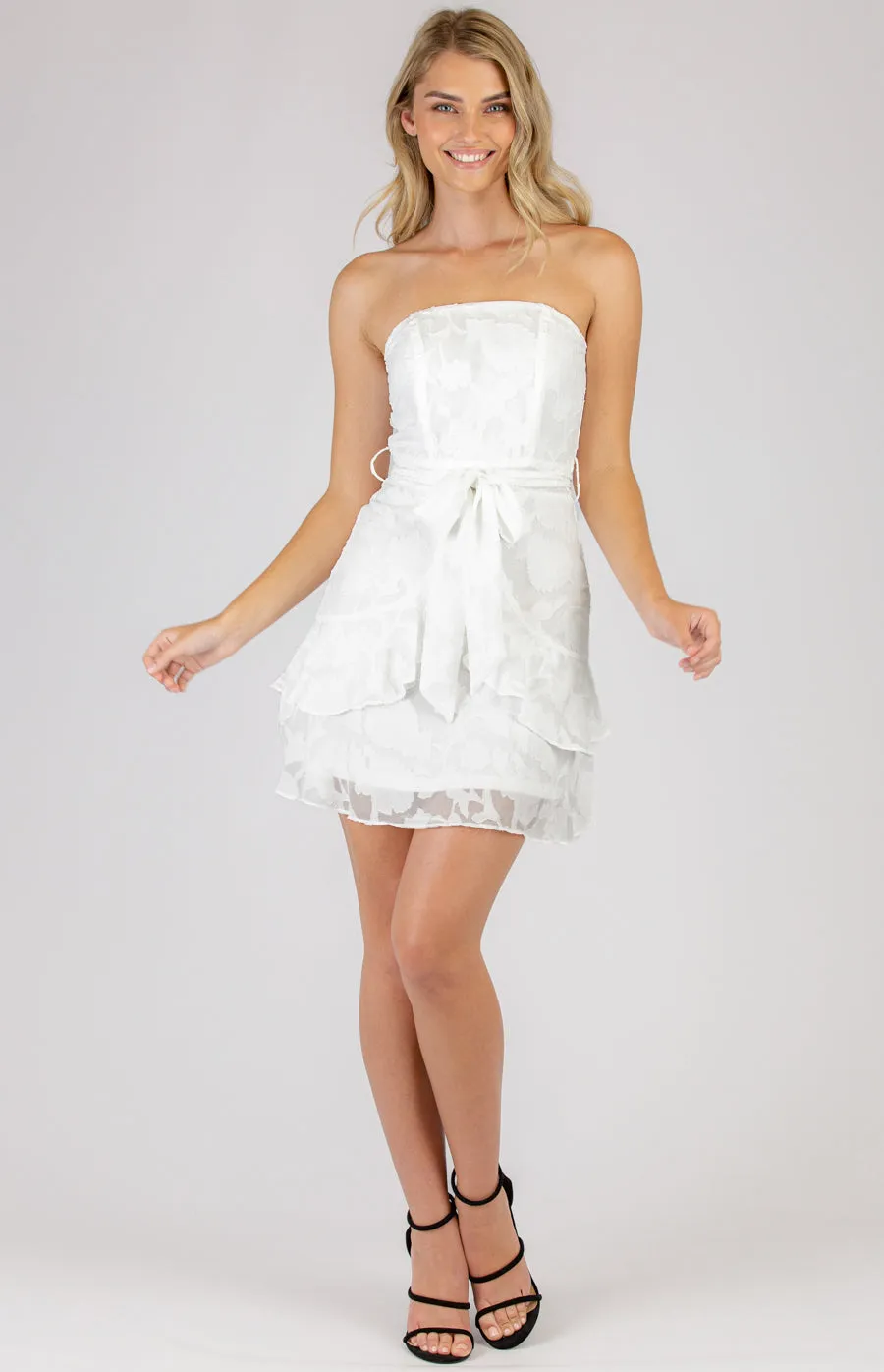 Hot little White Strapless Mini Dress with Frill Hem Details